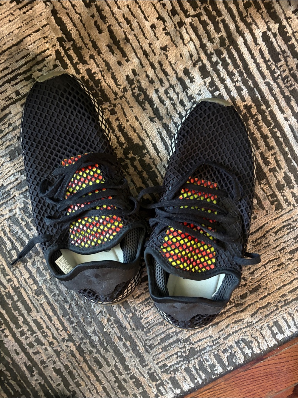 adidas Black Mesh Sneakers with Red and Yellow Tongue Detail